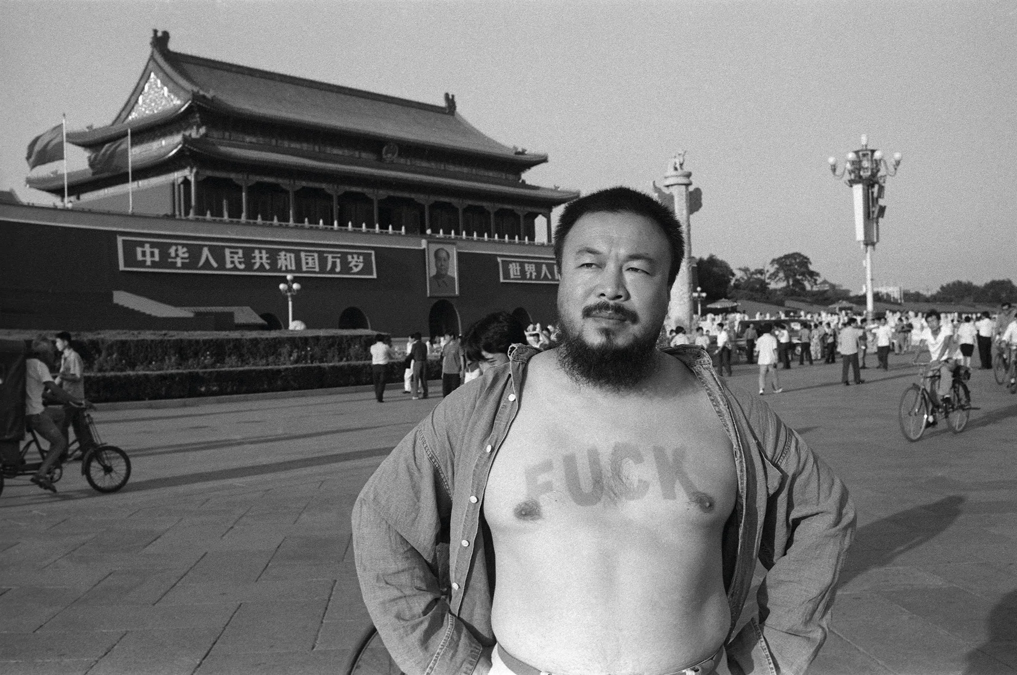 Ai-Weiwei-with-the-word-'FUCK'-sunburned-onto-his-chest,-Tiananmen-Square,-Beijing,-2000.jpg